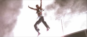 John McClane leaps in Die Hard.